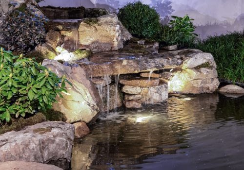 Natural-styled flagstone waterfall water feature